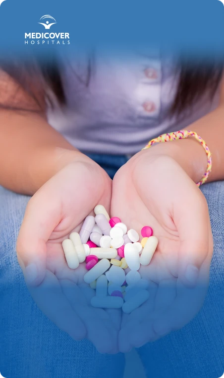 child taking multivitamins